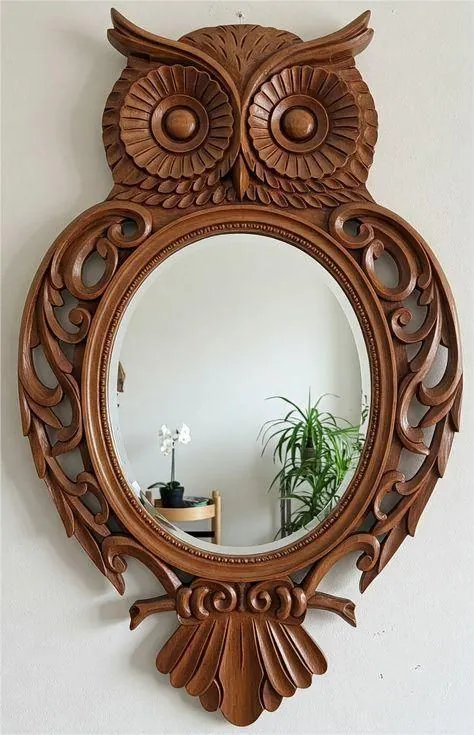 Carved wooden owl mirror