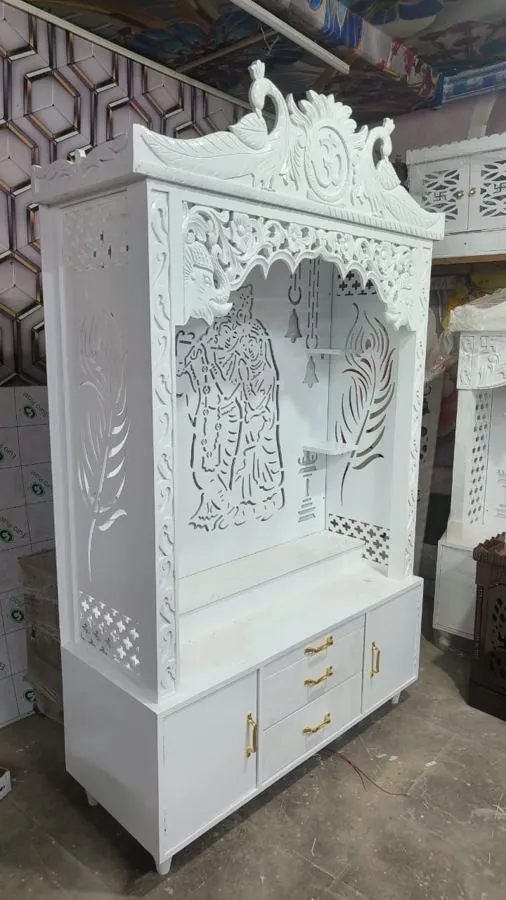 White carved Korean mandir with peacock crown
